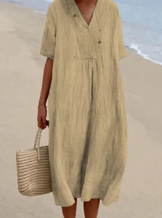 Elegante damesjurk met midi lengte, perfect als comfortabele casual jurk of strandjurk.