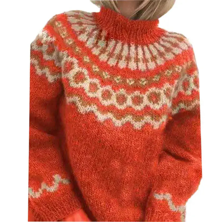 Klassieke dames trui met Noors motief en warme coltrui hals. Een veelzijdige gebreide trui voor een elegante winterlook.