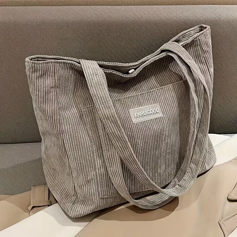 Dames corduroy shopper met magneetsluiting, ideaal voor dagelijks gebruik of werk.