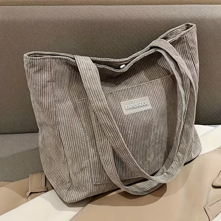 Dames corduroy shopper met magneetsluiting, ideaal voor dagelijks gebruik of werk.
