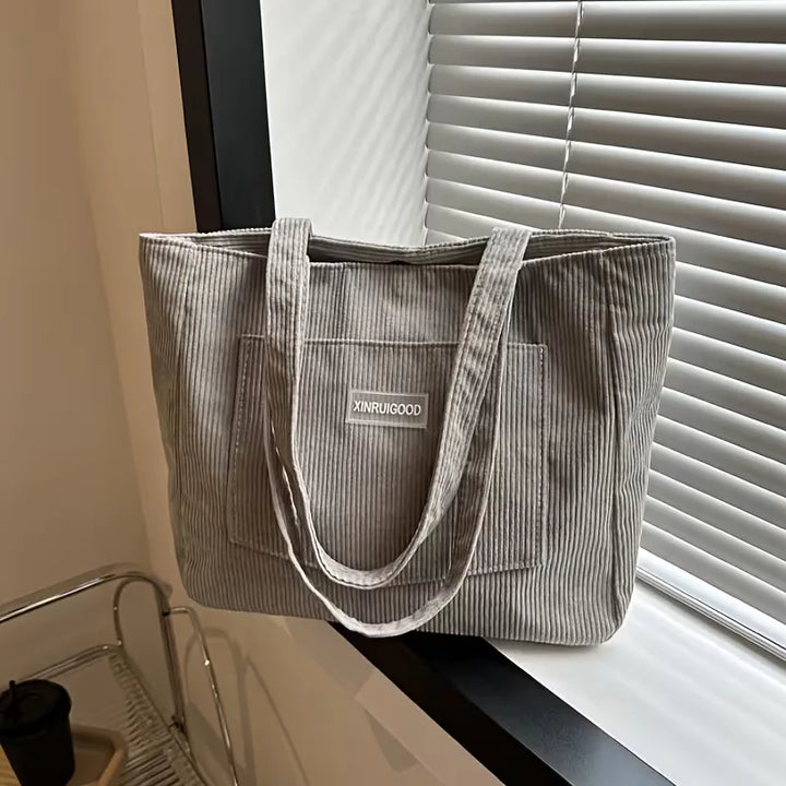 Grote corduroy shopper voor dames, perfect als werktas of reistas.