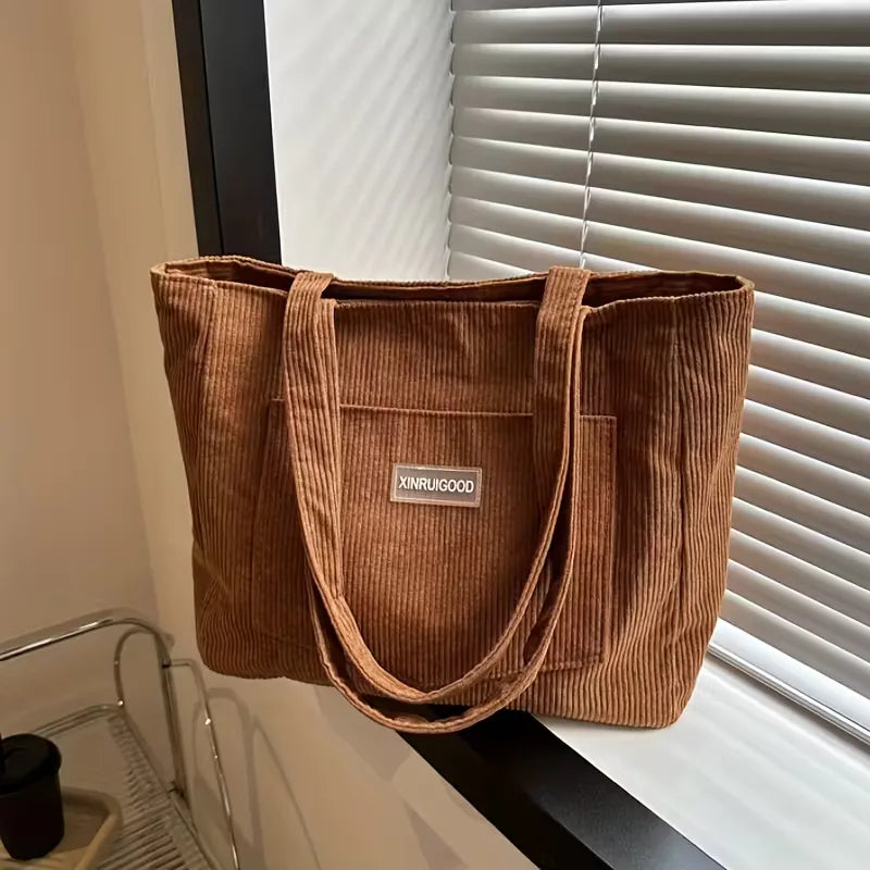 Trendy corduroy dames schoudertas met veilige magneetsluiting, veelzijdig in gebruik.