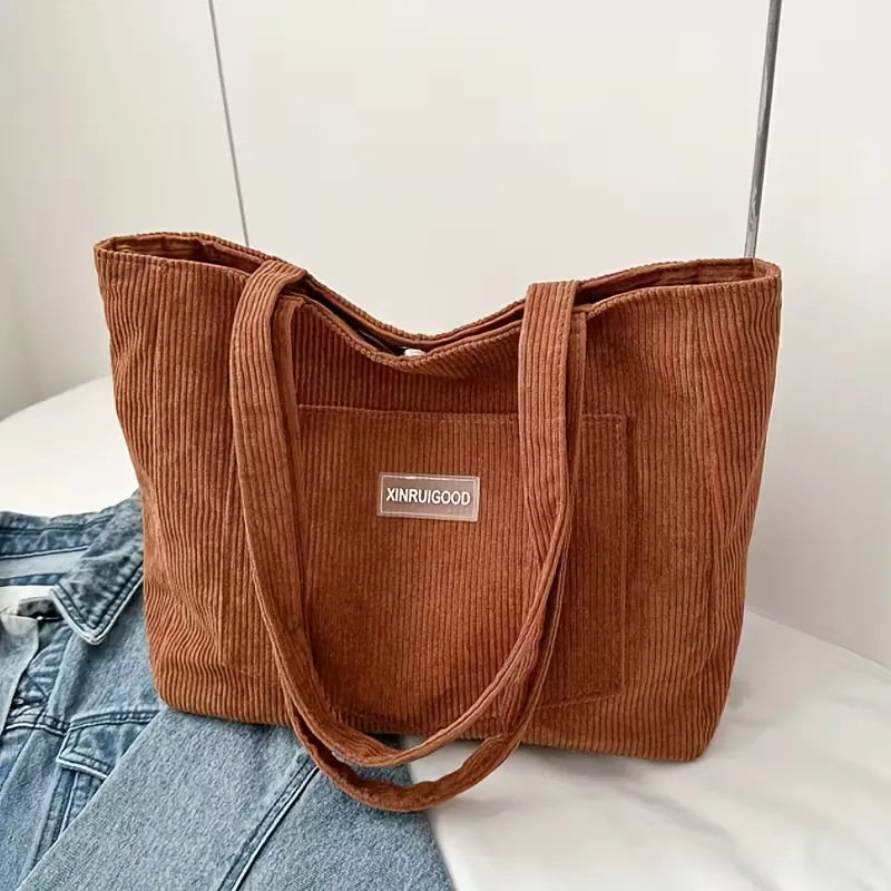 Praktische dames shopper van corduroy, ideaal als werktas met magneetsluiting.