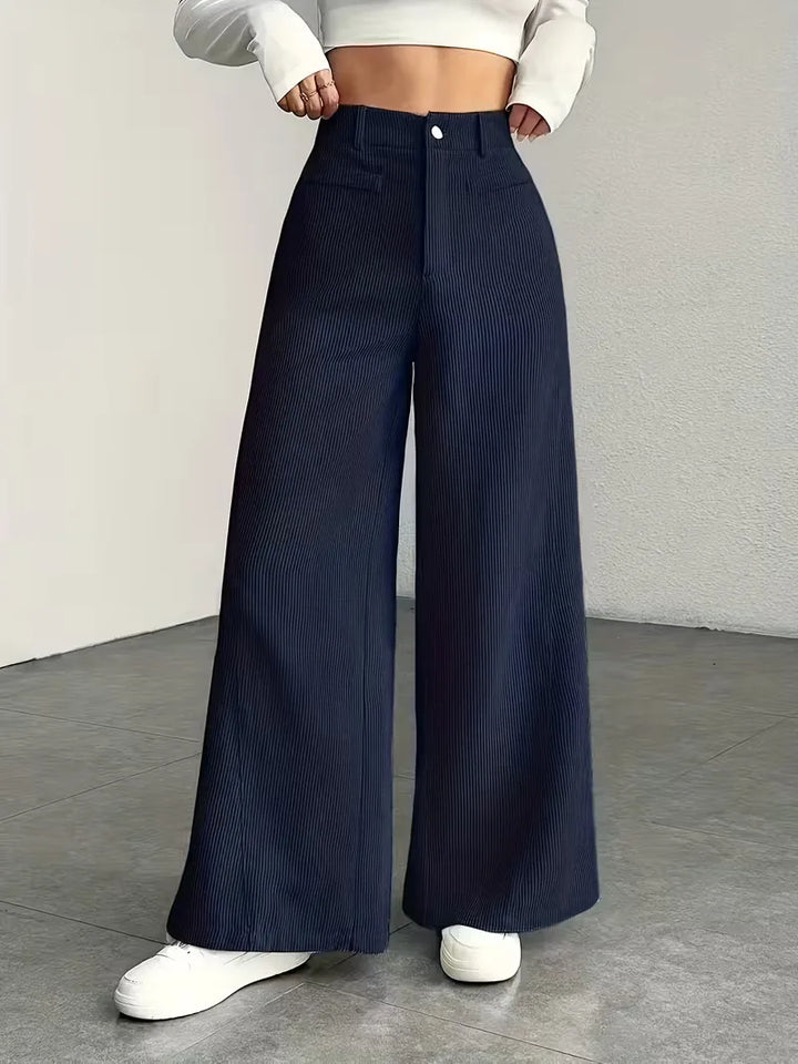 Donkerblauwe wide leg damesbroek met hoge taille, comfortabel en stijlvol.