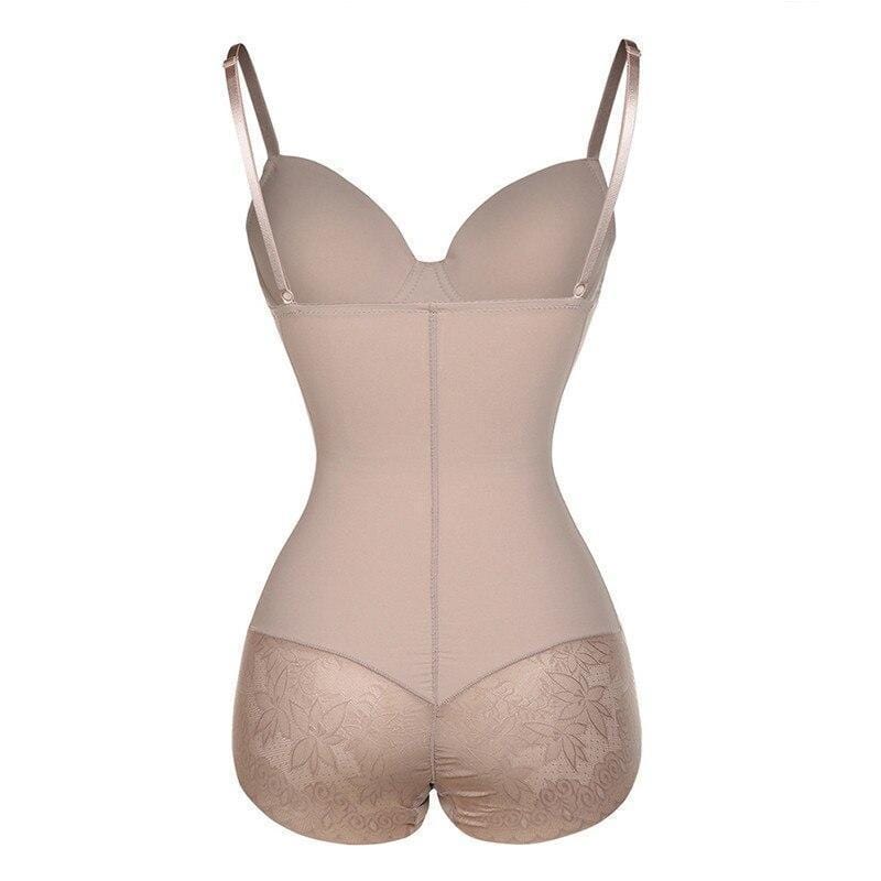 Model draagt zwarte dames corrigerende bodyshaper die de taille versmalt en de borsten lift, onzichtbaar onder kleding.