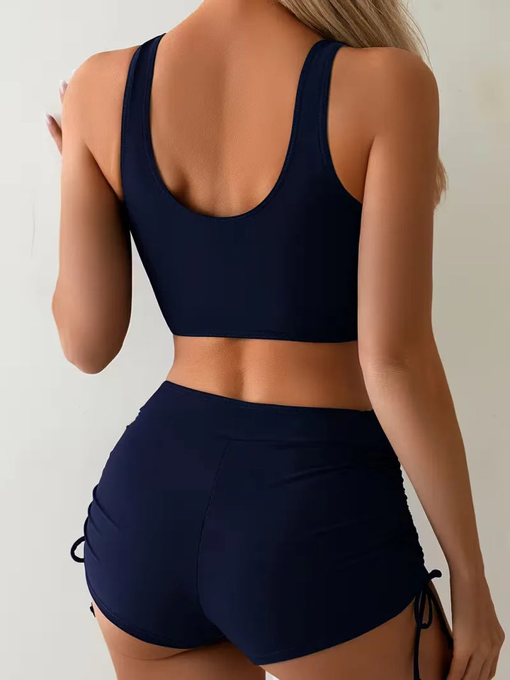 Dames strandkleding: Stijlvolle hoogtaille bikini met unieke criss-cross details. Ideaal voor de zomer.