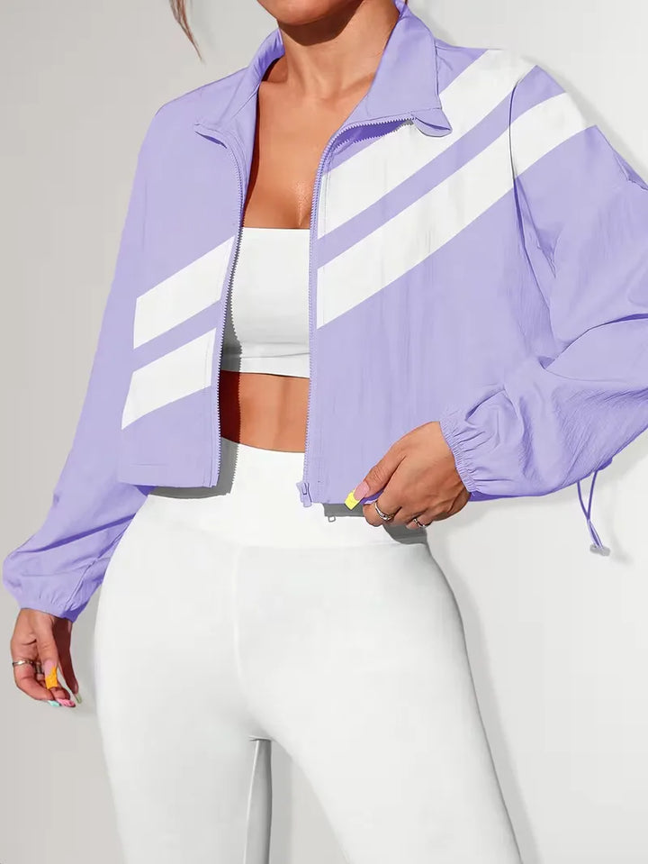 Dameskleding: verstelbaar track jacket, cropped, comfortabel voor lente/herfst.