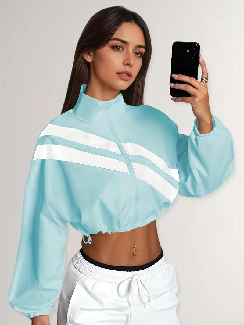 Trendy dames sportjack, cropped stijl, met diagonale strepen en comfortabele rits.