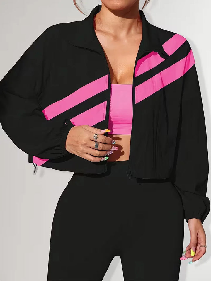 Veelzijdig cropped dames track jacket, met verstelbare pasvorm en rits.