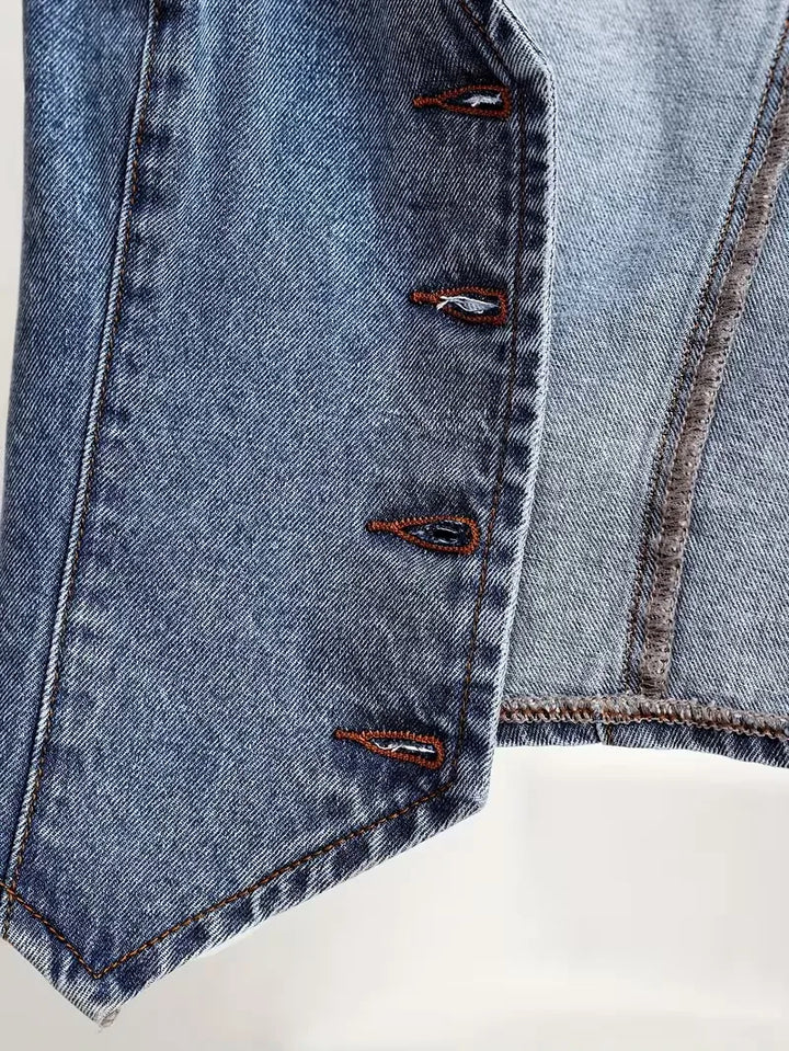 Casual dames denim gilet in koningsblauw met V-hals en puntige zoom, een modern mouwloos bovenstuk voor dames.
