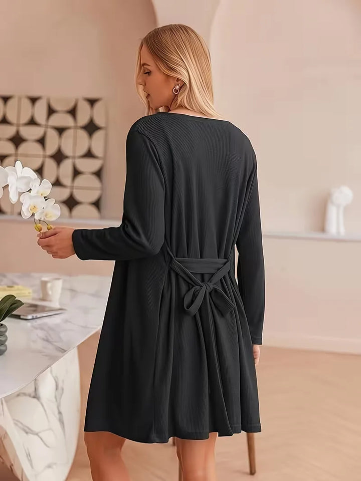 Close-up van de fijne wafelstructuurstof van de dames loungewear set.
