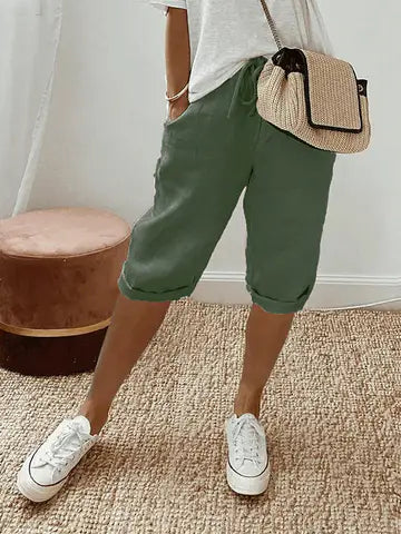 Comfortabele dames driekwart broek met relaxte pasvorm en elastische taille, perfect voor een casual, trendy zomerlook.