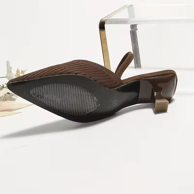 Comfortabele slip-on hakken met flare hak, ideaal voor lente/zomer damesmode.