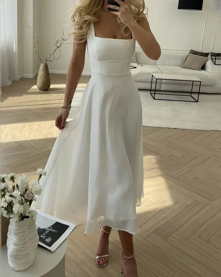 Dames elegante jurk met vierkante hals, ideaal voor een stijlvolle en tijdloze look.