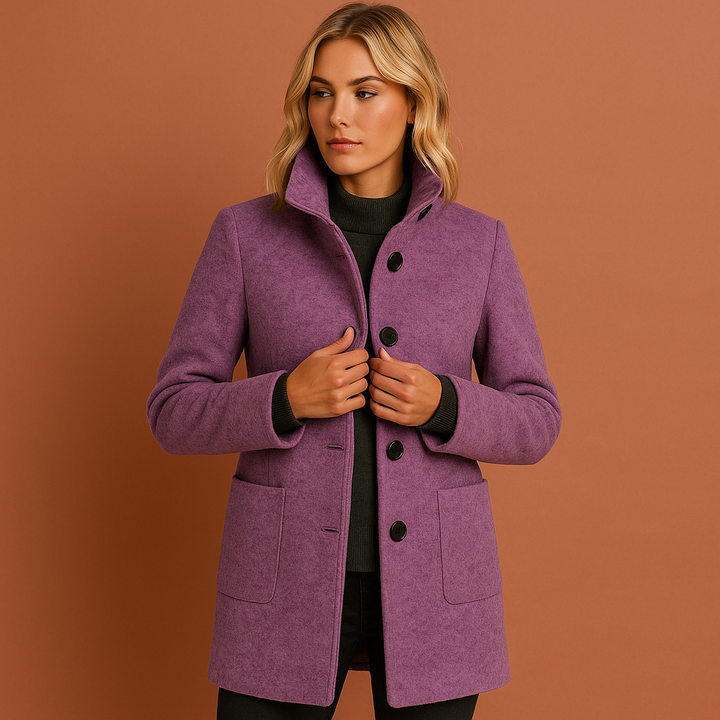 Lange elegante damesmanteljas met chique knopen, een must-have bovenkleding item.