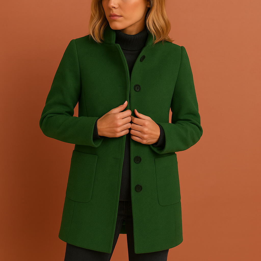 Klassieke lange dames manteljas met opvallende knopen, voor een tijdloze look.