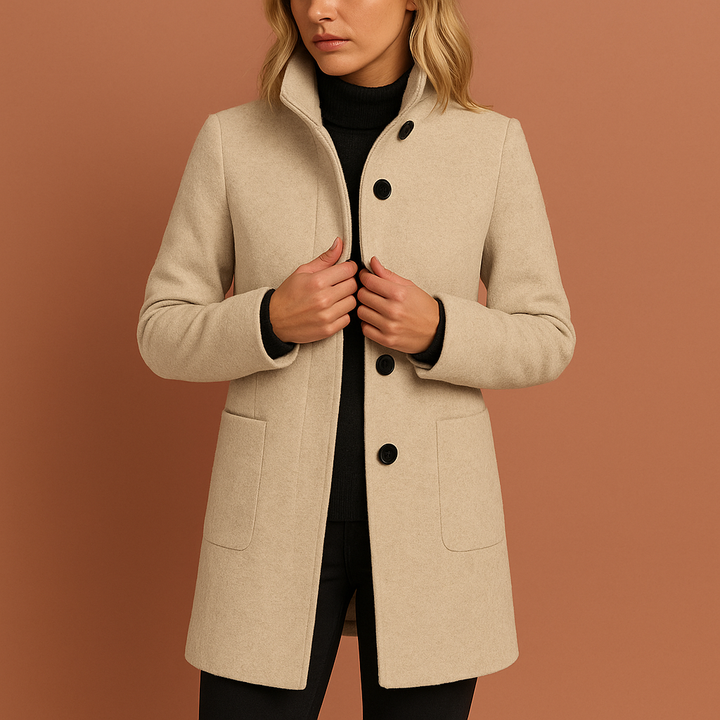 Verfijnde lange manteljas voor dames, met klassieke knopen; warme bovenkleding.