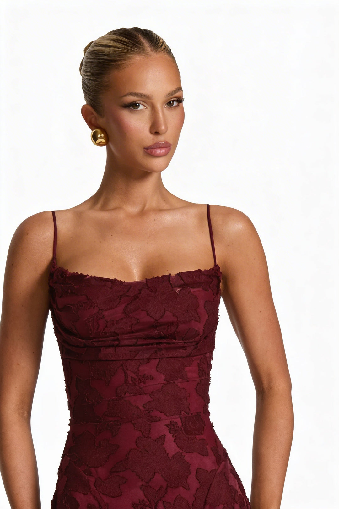Mouwloze maxi jurk voor dames met chique bloemen, gedrapeerde hals en spaghettibandjes.