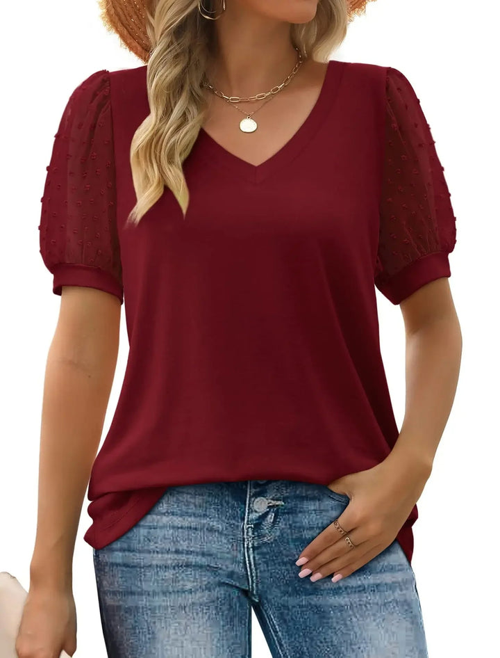 Damesmode: Comfortabele en modieuze V-hals top, perfect voor een elegante en chique zomerlook.