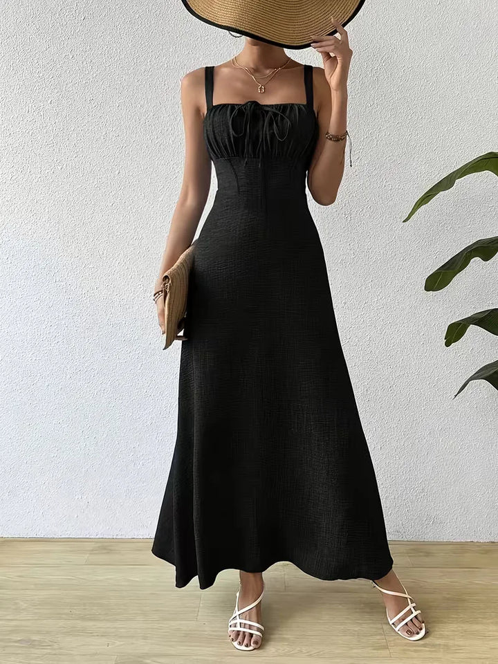 Elegante casual wikkeljurk voor dames, met spaghettibandjes, perfect voor de hitte.