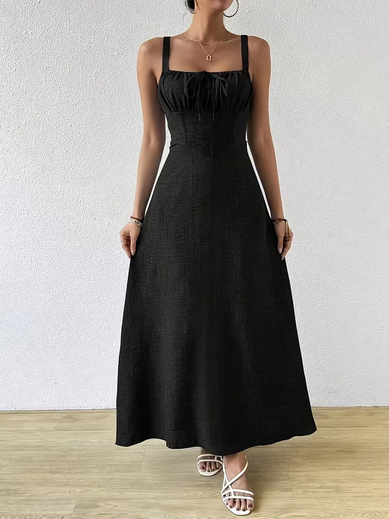 Zomerjurk dames, wikkelmodel met spaghettibandjes, ideaal voor vakantie.