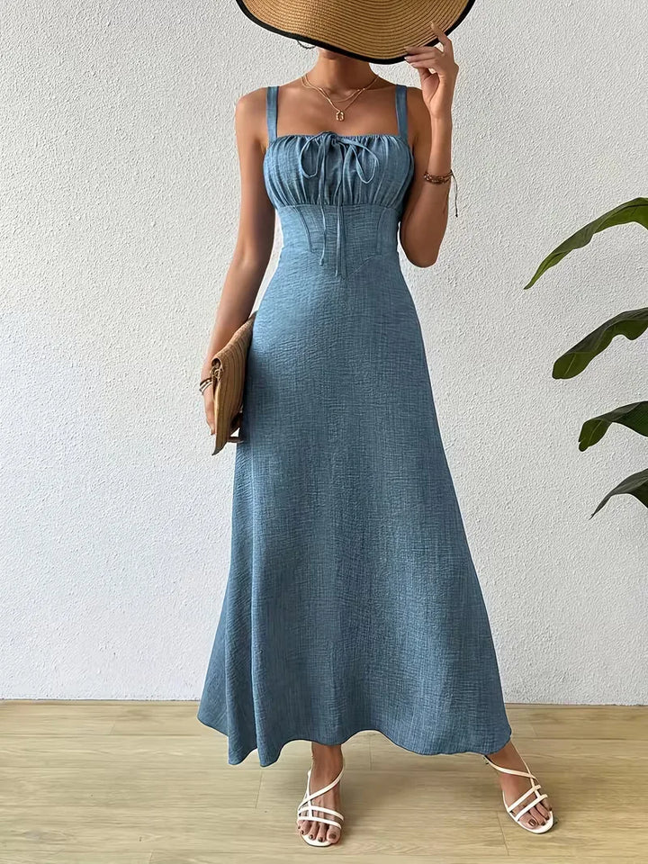 Lange dames wikkeljurk, spaghettibandjes, casual elegant voor de zomer.
