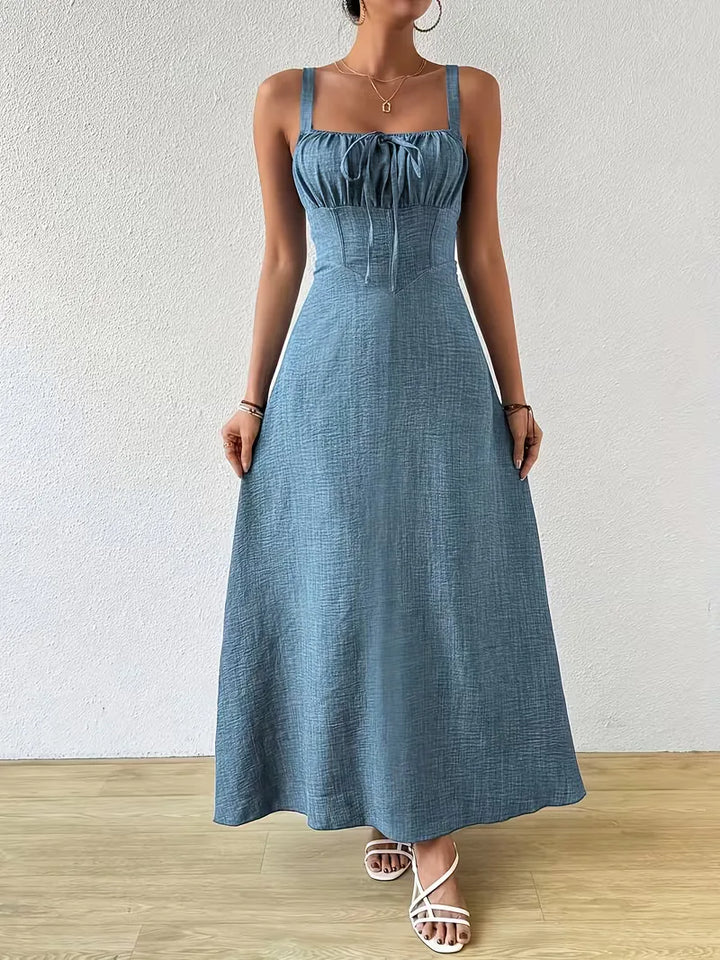 Stijlvolle dames zomerjurk, wikkelmodel met spaghettibandjes en sweetheart hals.