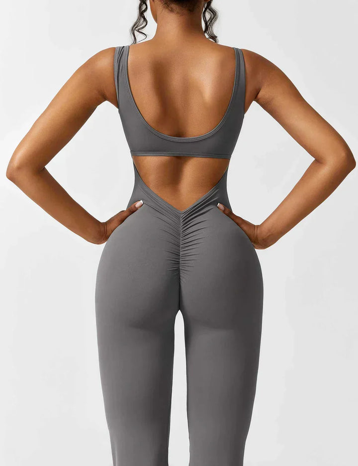 Dames figuurvormende jumpsuit, flared en elastisch, met V-rug voor een stijlvolle look.