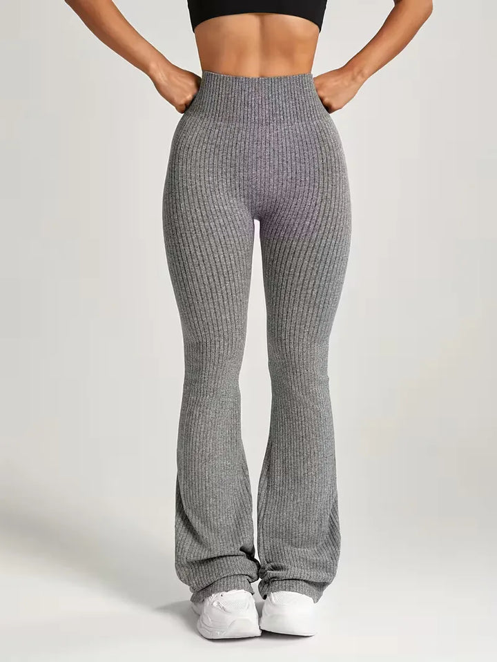 Dames flared legging met hoge taille, comfortabel en stijlvol voor sport of casual outfits.