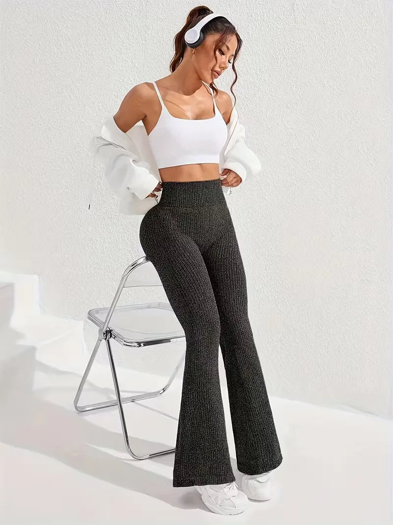 Hoge taille sportlegging dames, flared pijpen, comfortabel en ondersteunend voor workouts.