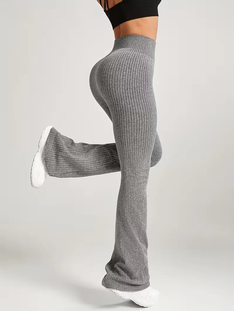 Veelzijdige dames legging met flared pijpen en hoge taille, perfect voor zowel sport als vrije tijd.