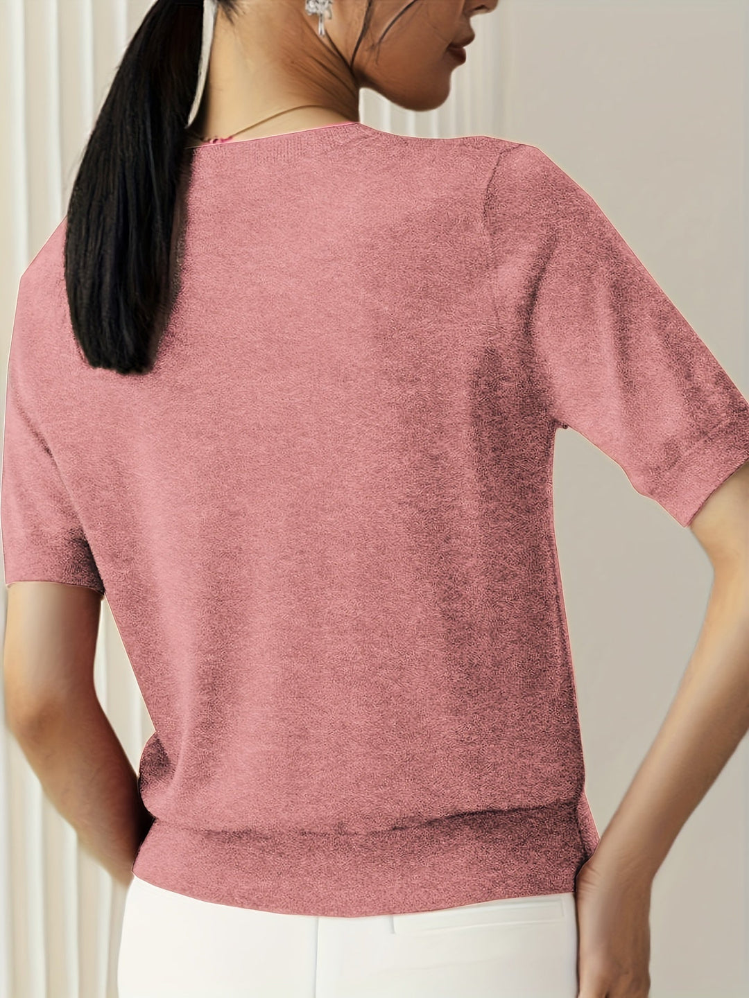 Casual gebreide dames trui met ronde hals en korte mouwen, comfortabel en modieus.