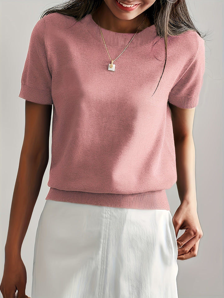 Moderne gebreide damestrui, korte mouwen, ronde hals, ideaal voor een elegante zomerlook.