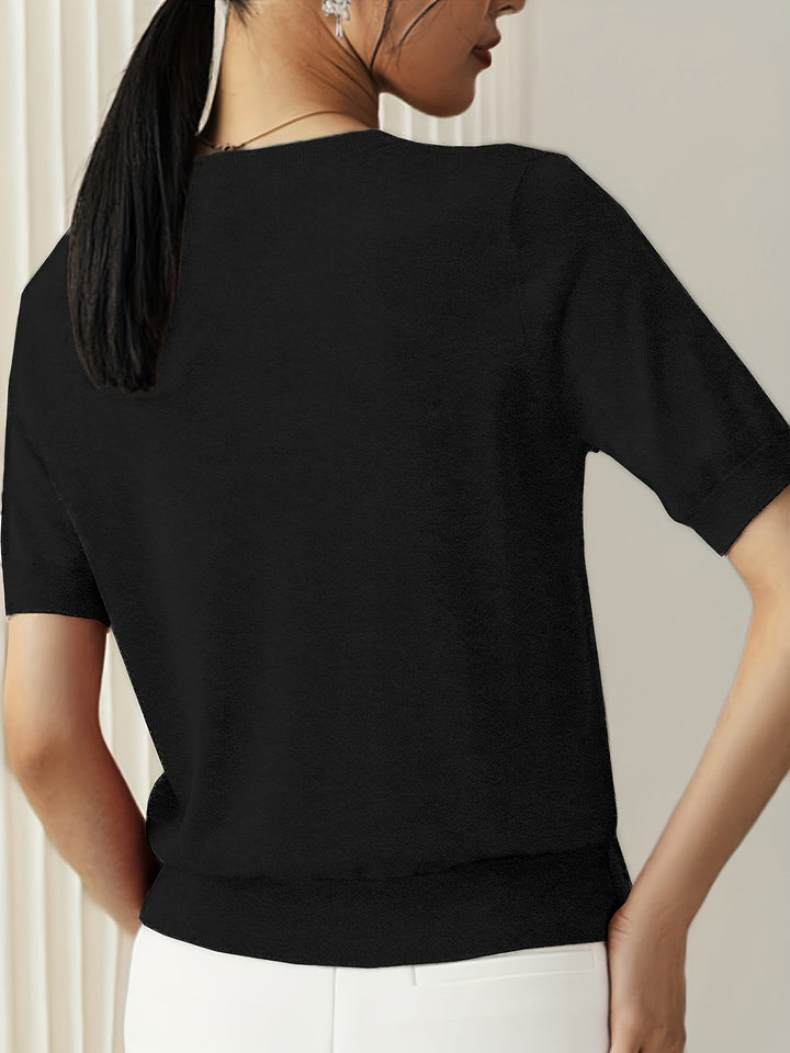 Comfortabele gebreide trui voor dames, korte mouwen, ronde hals, perfect voor elke stijl.