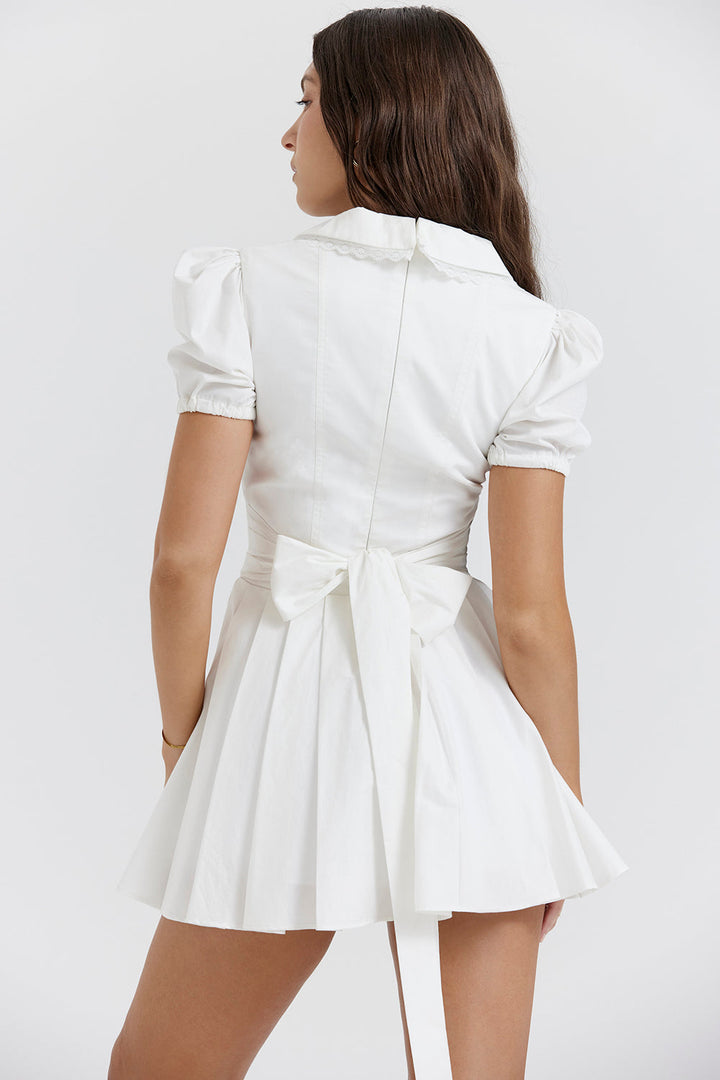 Elegante dames mini-jurk met V-hals en geplooide rok, trendy pofmouwen. Ideaal als feest- of zomerjurk.
