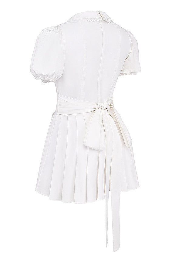 Trendy dames mini-jurk met elegante V-hals, geplooid ontwerp en volumineuze pofmouwen. Veelzijdige jurk.