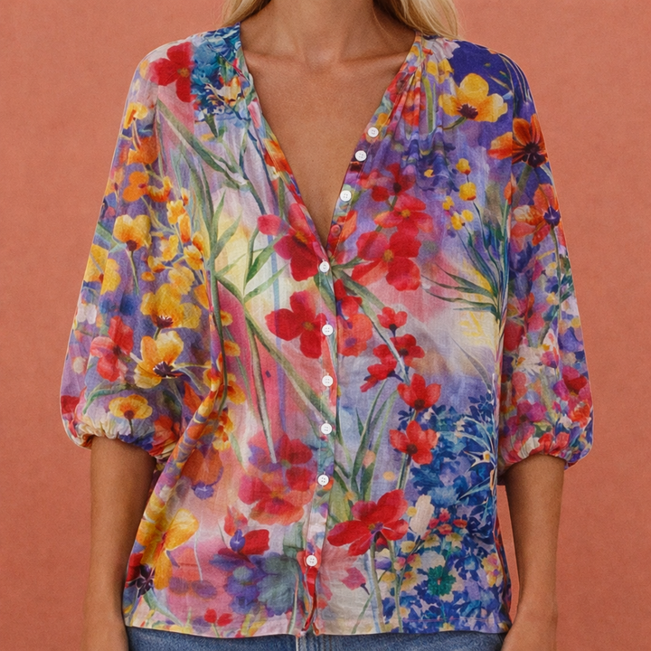 Veelkleurige geprinte dames lente blouse, stijlvol en comfortabel, met V-hals en knoopsluiting.