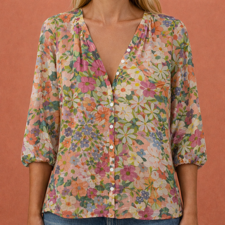 Stijlvolle geprinte damesblouse met V-hals, korte mouwen en knoopsluiting, veelkleurig en comfortabel.