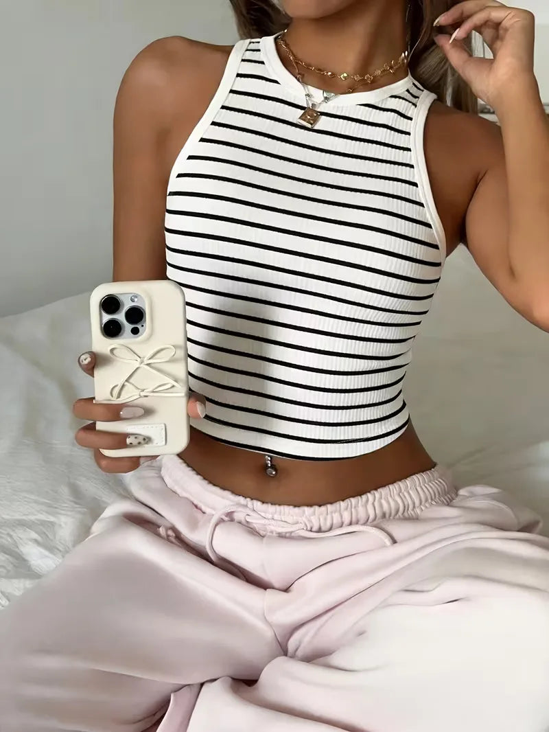 Dames geribbelde crop top, mouwloos, perfect voor de zomer. Comfortabel en trendy slim fit design.