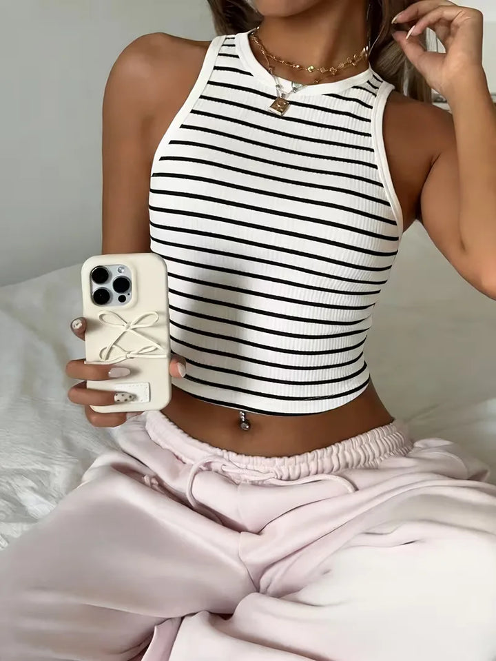 Dames geribbelde crop top, mouwloos, perfect voor de zomer. Comfortabel en trendy slim fit design.