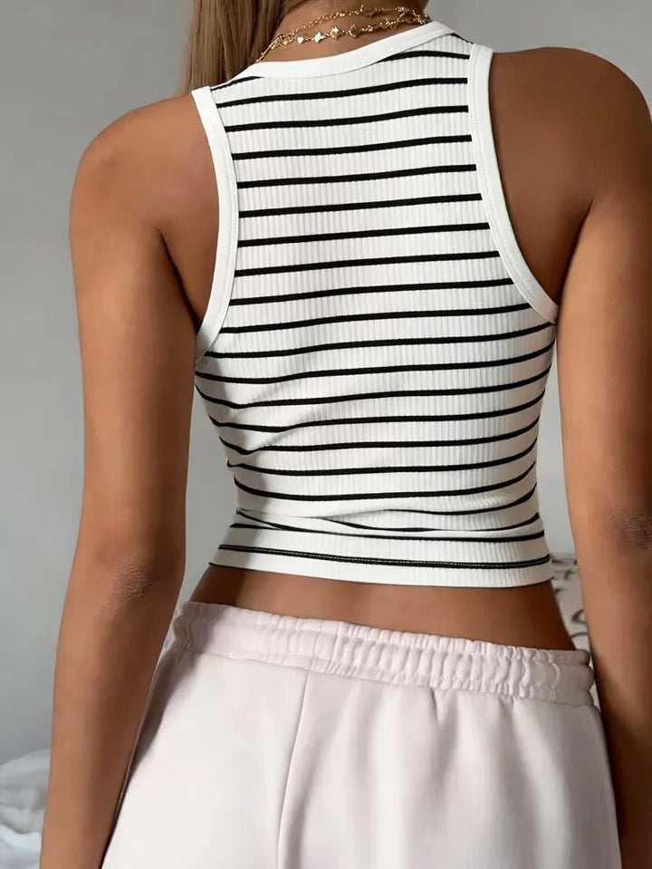 Comfortabele dames geribbelde mouwloze crop top. Trendy slim fit voor de zomer, met subtiel gestreept patroon.