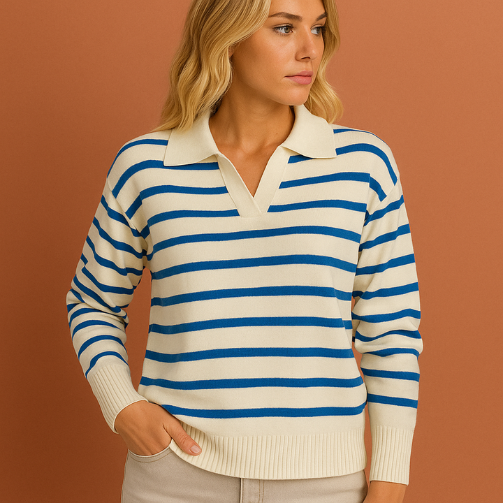 Close-up van het stijlvolle gestreepte dames polo shirt met lange mouwen, toont textuur en fijne afwerking.