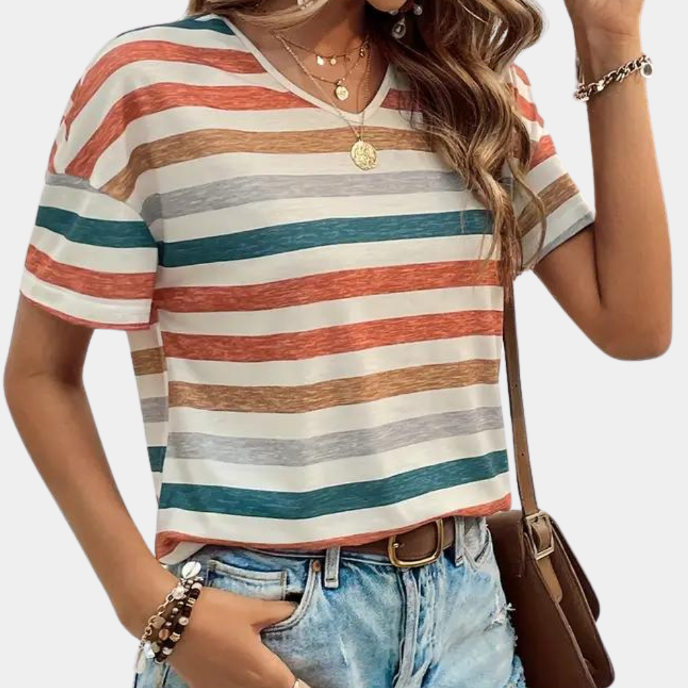 Frisse gestreepte top voor dames, een essentiële aanvulling op je zomer- en lentegarderobe.