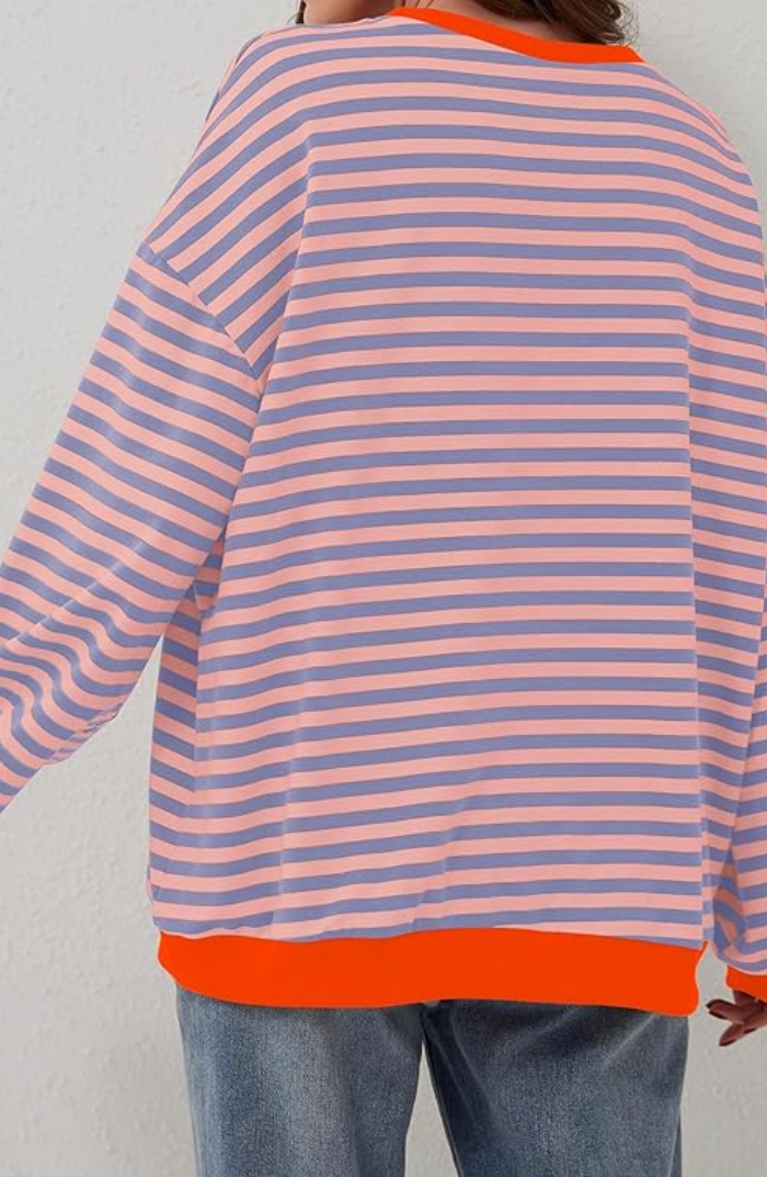 Elegante gestreepte damestrui in oversized stijl; veelzijdig voor zowel casual als geklede momenten.