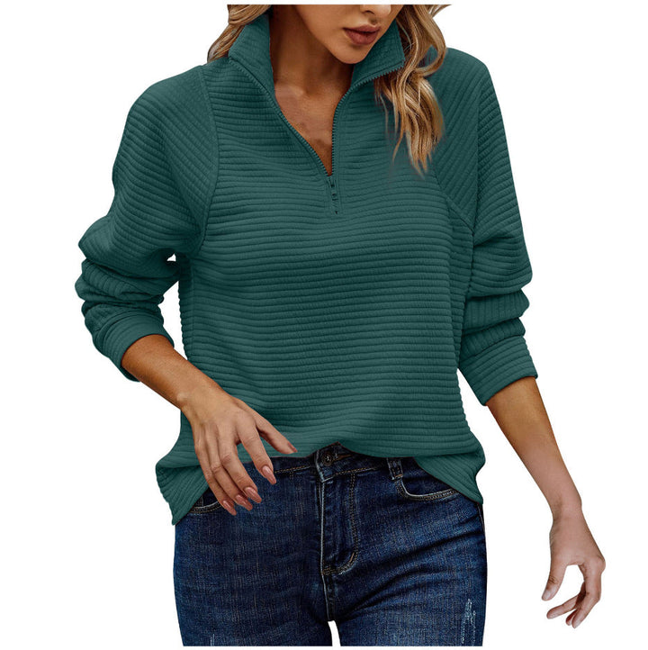 Trendy dames trui met opvallende strepen en een halve rits, perfect voor casual comfort.