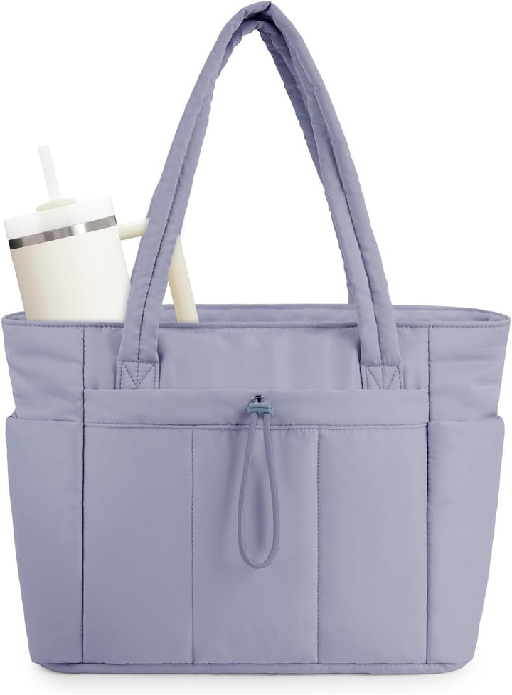 Dagelijkse tas voor dames: gewatteerde puffer met bekerhouder, laptopvak en ruime opbergruimte.