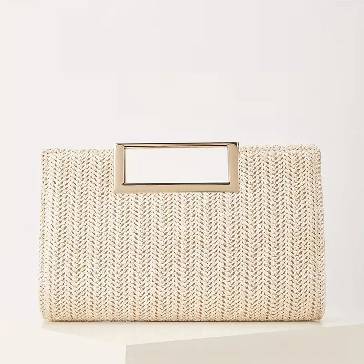 Modieuze gele geweven dames handtas, met verfijnde vierkante handgreep. Prachtige clutch voor feestjes.