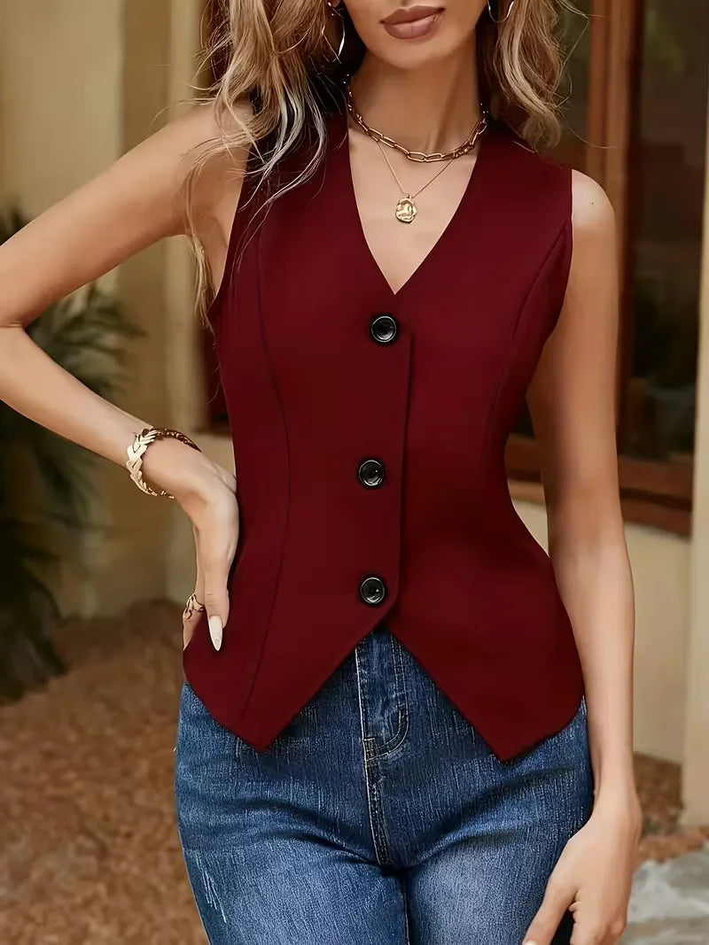 Klassiek rood damesgilet met V-hals en knoopsluiting. Een stijlvol, mouwloos item voor elke gelegenheid.