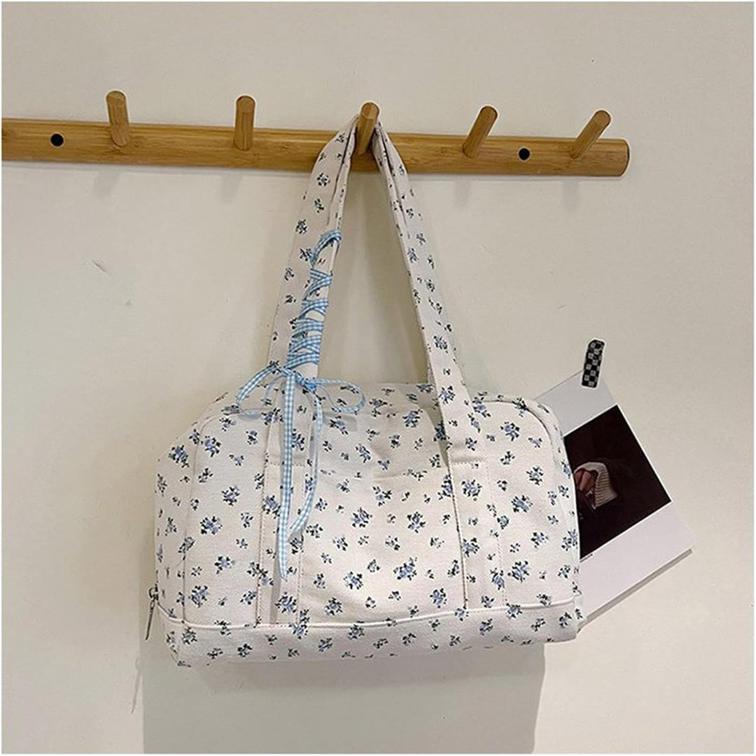 Modieuze dames canvas weekendtas, groot formaat met lintaccent, ideaal als reistas of gymtas.