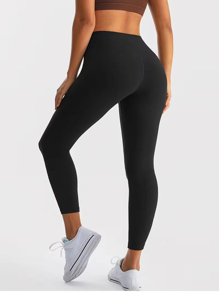 Slim fit enkellengte dames legging, high-waisted. Comfortabel en effen voor sport, yoga en casual lente.